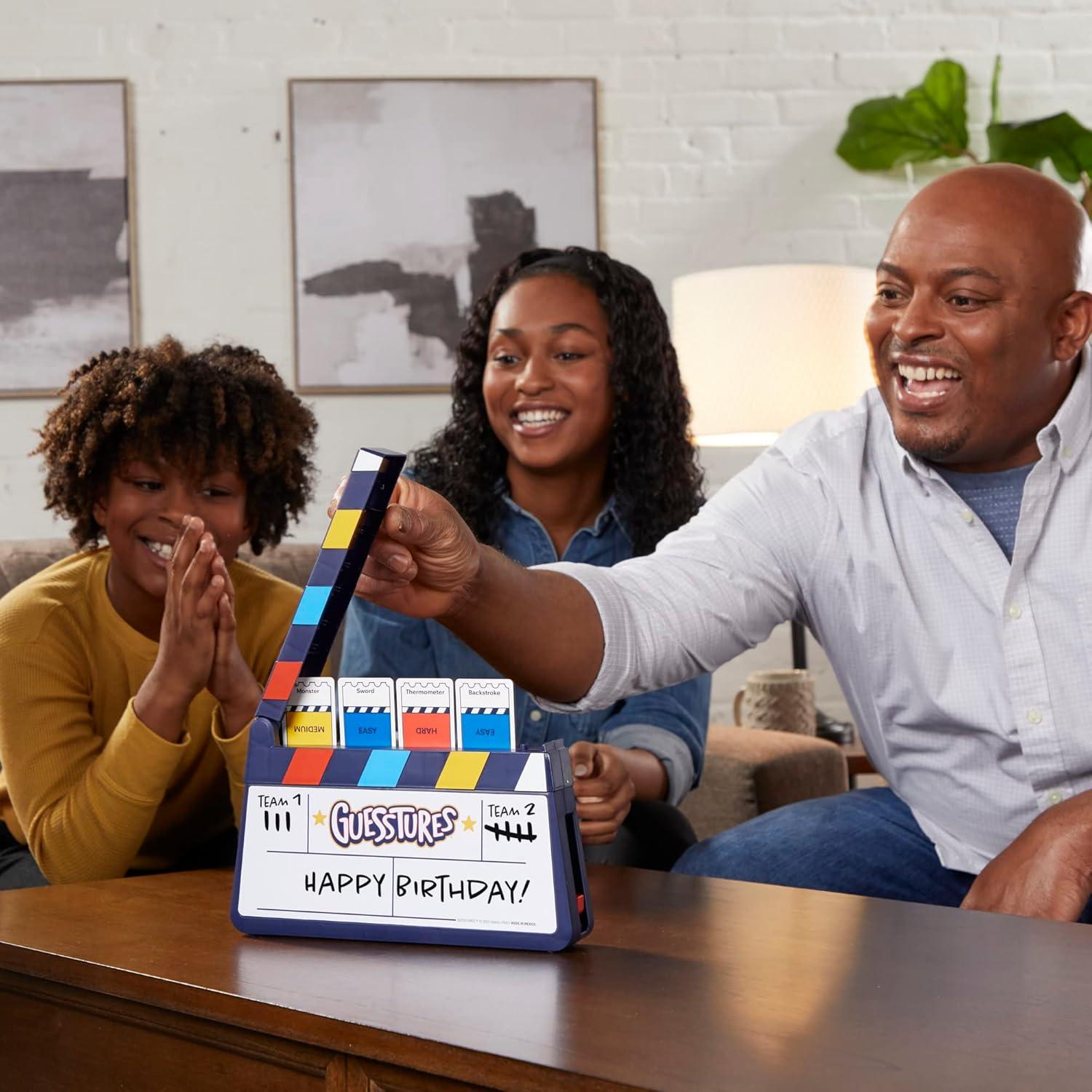 imageHasbro Gaming Guesstures Game Charades Games for 4 or More Players Includes Customizable Cards and Clapper Family Party Game for Ages 8 and Up