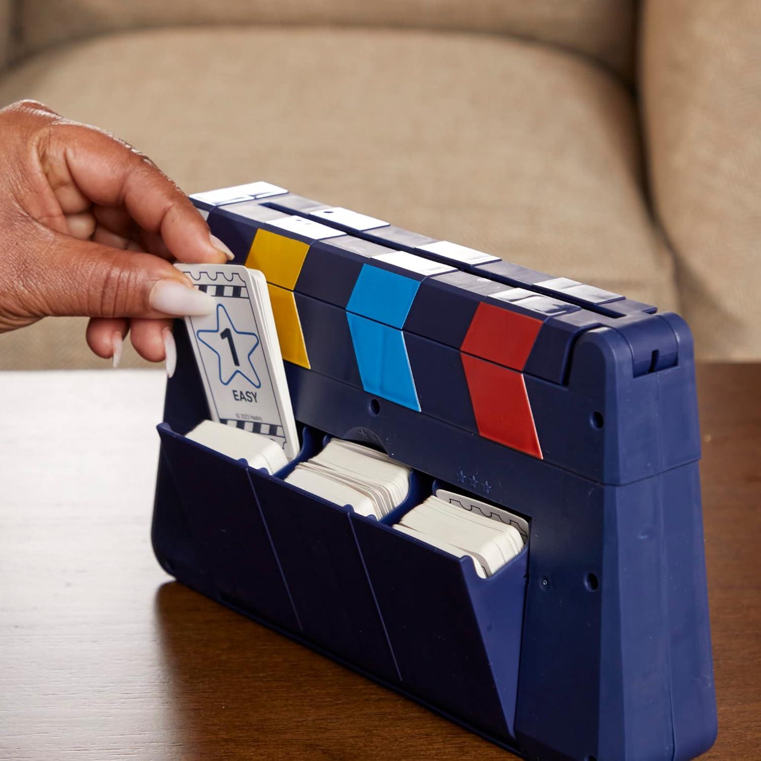 imageHasbro Gaming Guesstures Game Charades Games for 4 or More Players Includes Customizable Cards and Clapper Family Party Game for Ages 8 and Up