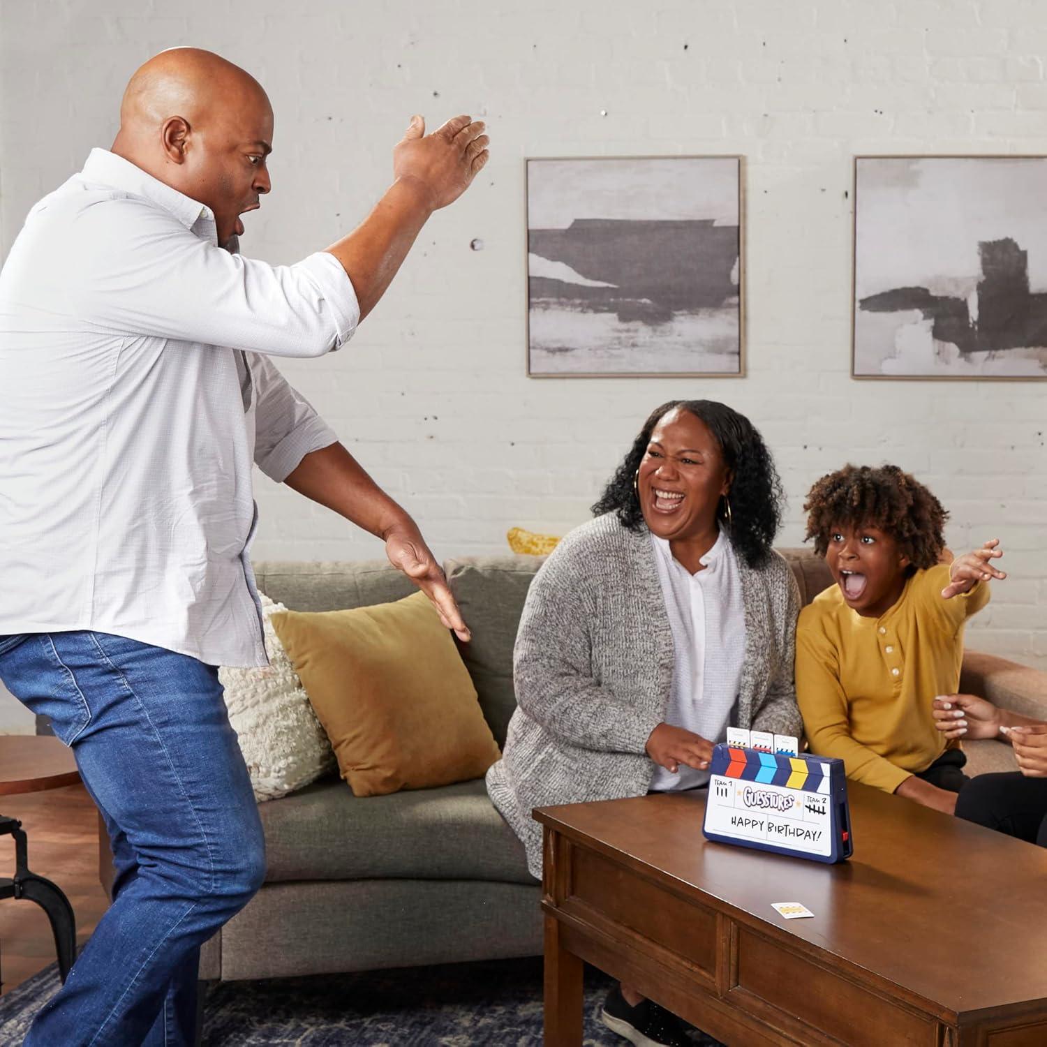 imageHasbro Gaming Guesstures Game Charades Games for 4 or More Players Includes Customizable Cards and Clapper Family Party Game for Ages 8 and Up