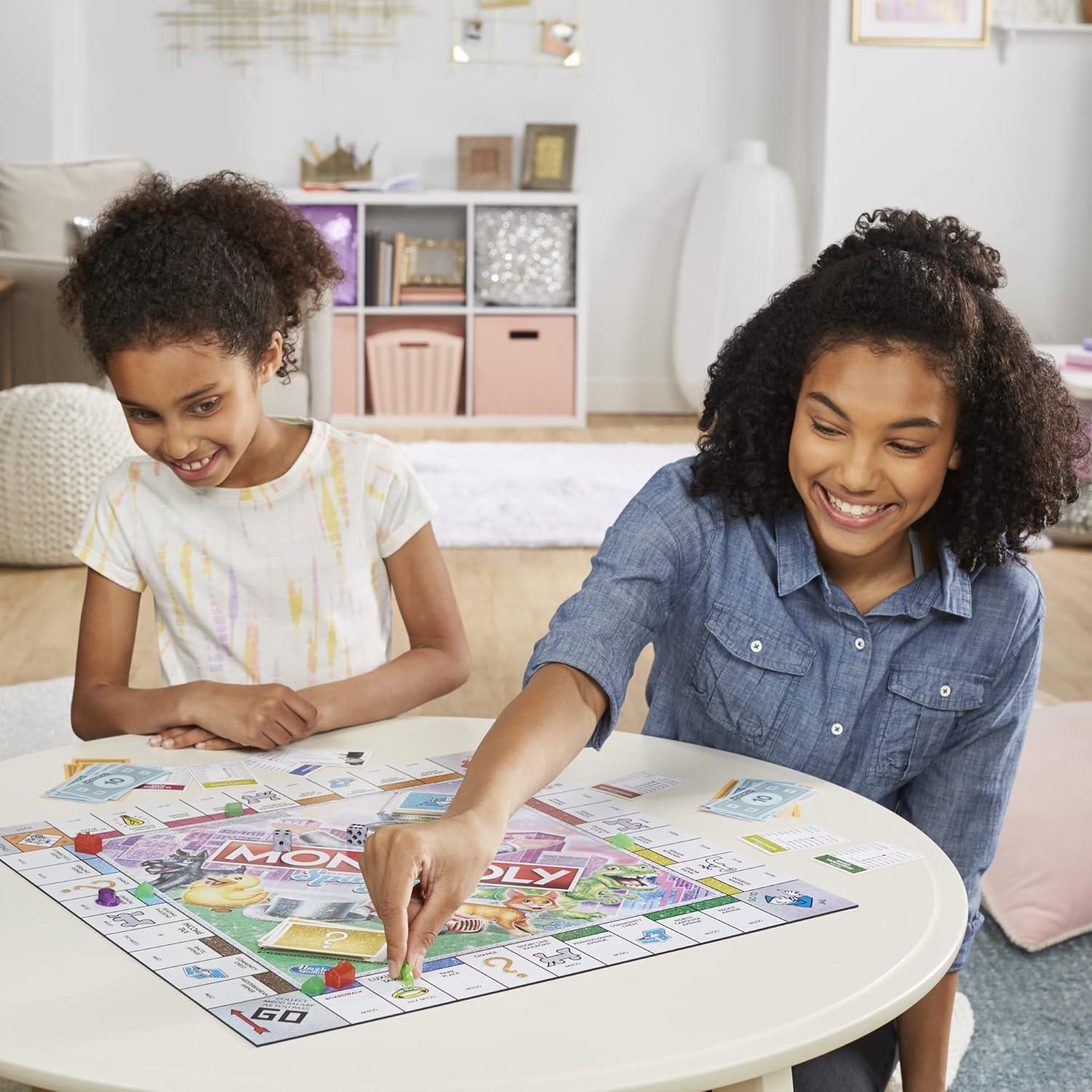 imageHasbro Gaming Monopoly Sparkle Edition Board Game Family Games with Glittery Tokens Pearlescent Dice Sparkly Look Amazon Exclusive