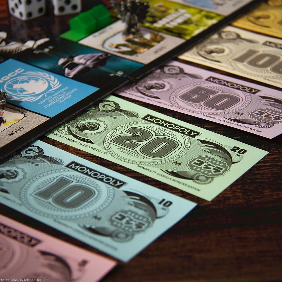 imageMonopoly Godzilla Based on Classic Monster Movie Franchise Godzilla Collectible Monopoly Game Featuring Familiar Locations and Iconic Kaiju Monsters