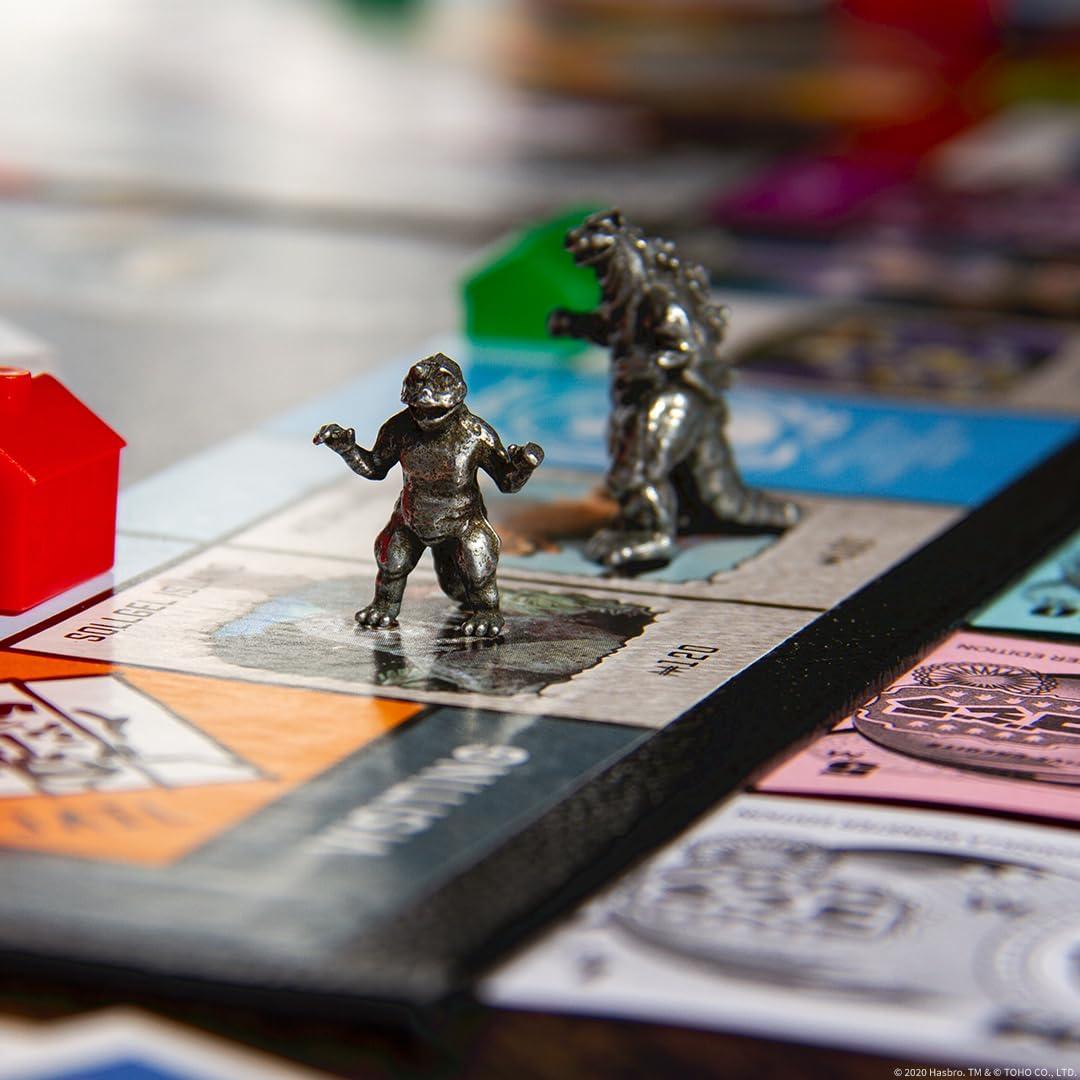 imageMonopoly Godzilla Based on Classic Monster Movie Franchise Godzilla Collectible Monopoly Game Featuring Familiar Locations and Iconic Kaiju Monsters