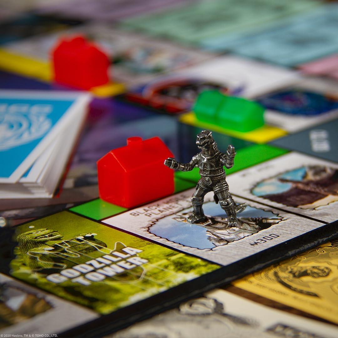 imageMonopoly Godzilla Based on Classic Monster Movie Franchise Godzilla Collectible Monopoly Game Featuring Familiar Locations and Iconic Kaiju Monsters