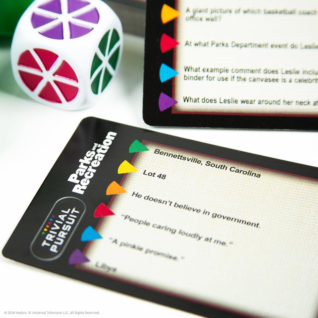 imageTrivial Pursuit Parks and Recreation Trivia Game from Parks and Recreation TV Series 600 Questions ampamp Die in Travel Container Officially Licensed Parks and Recreation Merchandise ampamp Collectible