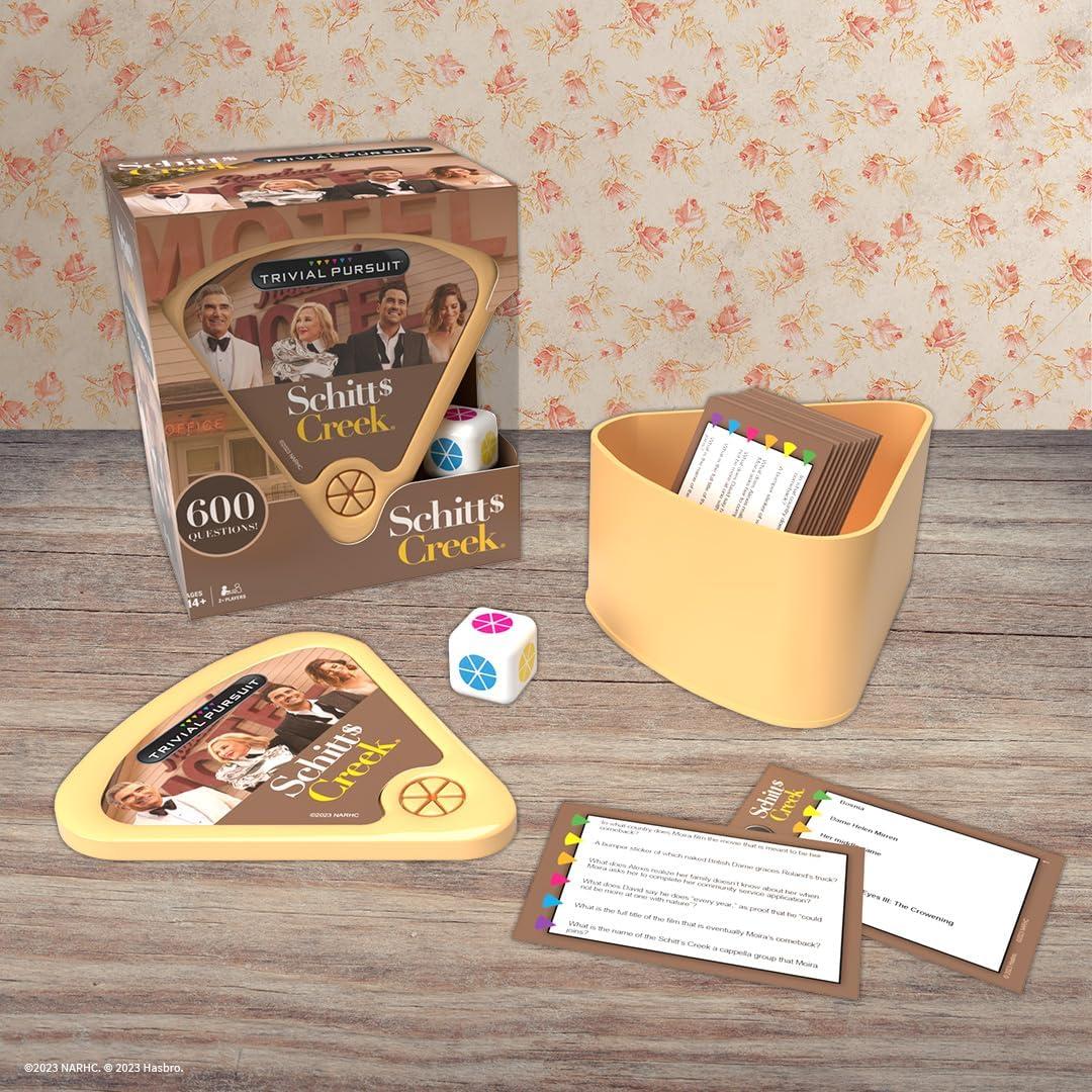 imageUSAOPOLY Trivial Pursuit Schitts Creek Edition Trivia Game Questions from Schitts Creek 600 Questions ampamp Die in Travel Container Officially Licensed Schitts Creek Game