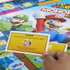 Monopoly Junior Super Mario Edition Board Game, Fun Kids’ Ages 5 and Up, Explore The Mushroom Kingdom as Mario, Peach, Yoshi, or Luigi (Amazon Exclusive)