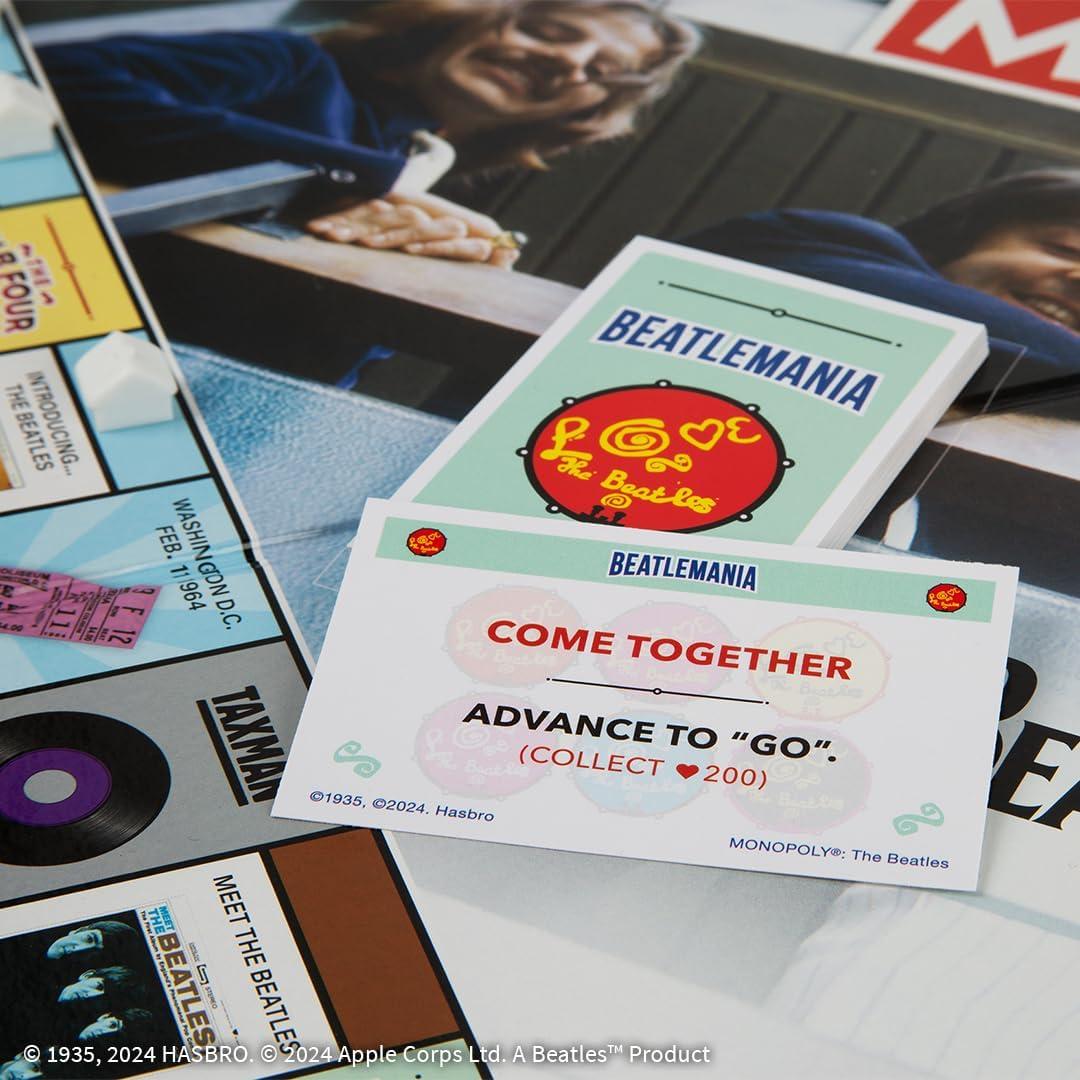 imageMonopoly The Beatles Play as Rocky Raccoon Maxwells Silver Hammer I Am The Walrus ampamp More Officially Licensed Collectible Game Based on The Beatles Rock Band for 26 Players