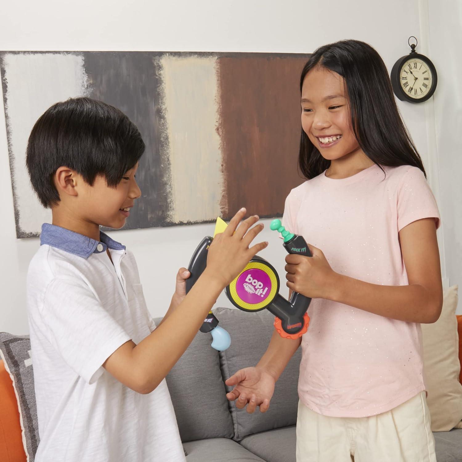 imageHasbro Gaming Bop It Extreme Electronic Game for 1 or More Players Fun Party Interactive Game for Kids Ages 8 4 Modes Including OneOnOne Mode Amazon Exclusive
