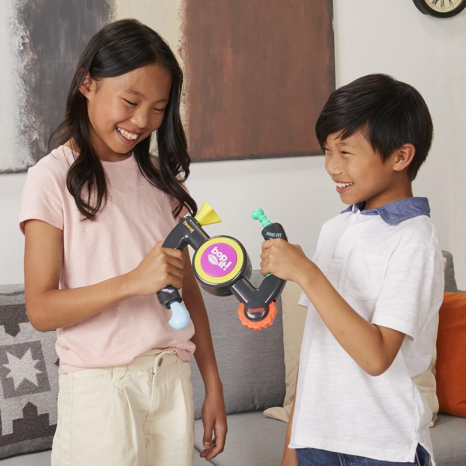 imageHasbro Gaming Bop It Extreme Electronic Game for 1 or More Players Fun Party Interactive Game for Kids Ages 8 4 Modes Including OneOnOne Mode Amazon Exclusive