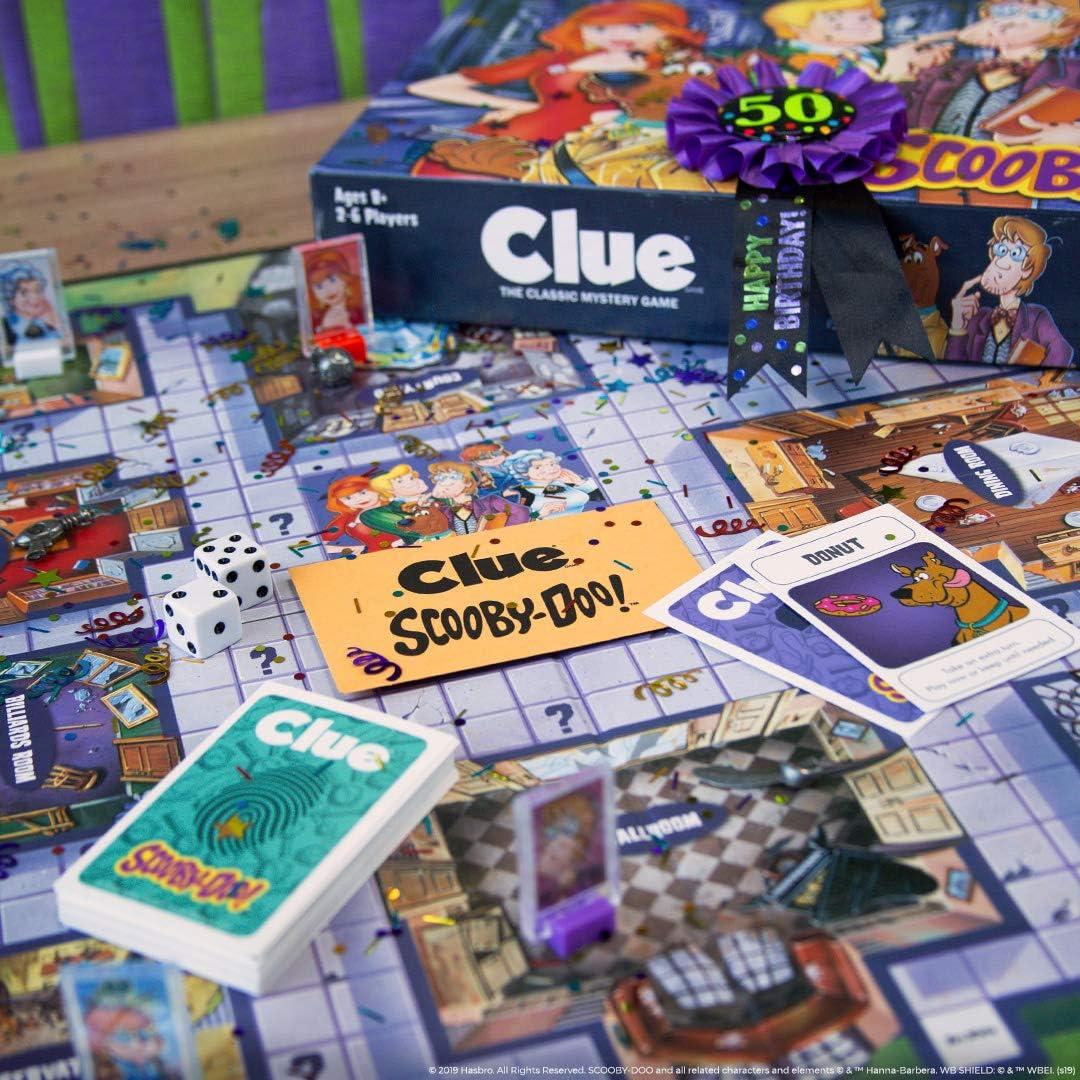 imageCLUE ScoobyDoo Board Game Official ScoobyDoo Merchandise Based on The Popular ScoobyDoo Cartoon Classic Clue Game Featuring ScoobyDoo Characters Gather The Gang and Solve The Mystery