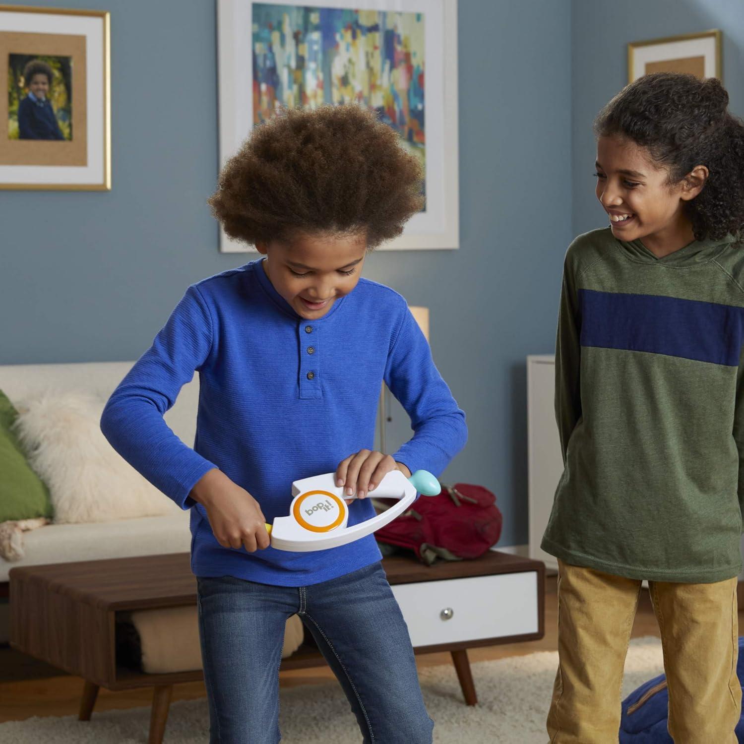 imageHasbro Gaming Bop It Electronic Game for Kids Ages 8 and up Kids Games for 1 or More Players Board Games for Kids Kids Gifts